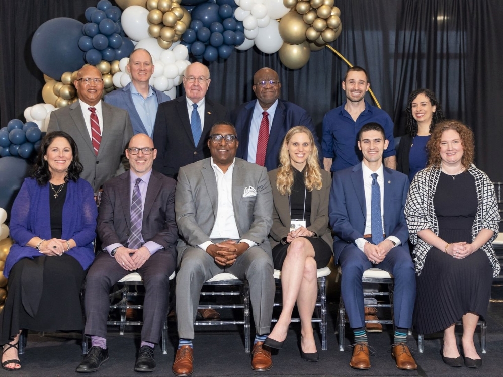 The College of Education and Health Professions' dozen 2024 Outstanding Alumni Award winners