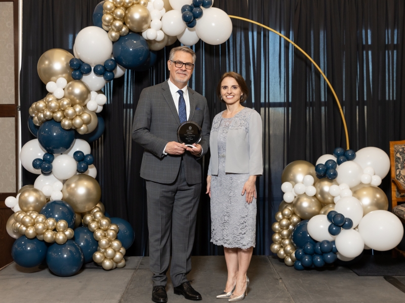 Dean Kate Mamiseishvili and 2025 Circle of Care Award recipient Gary Stark