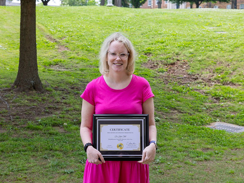 Dr. Julie Hill, an assistant professor in the Counselor Education and Supervision program, received the American Rehabilitation Counseling Association's Rehabilitation Counselor Educator of the Year Award.