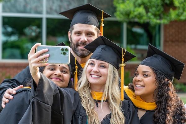 Communication Disorders graduates take a selfie