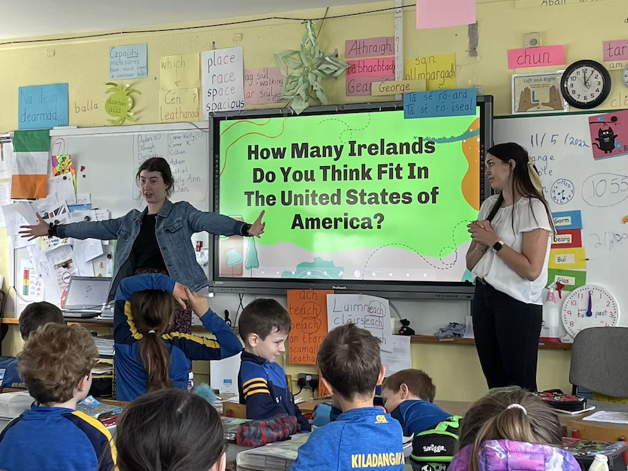Students on the May 2022 Study Abroad excursion to Ireland give a presentation at Scoil Chill an Daingin, a primary school in Puckane, North Tipperary.